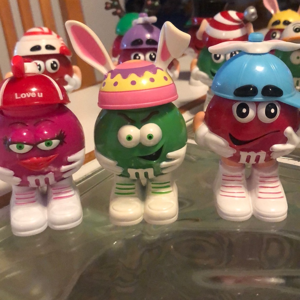 Collectible M&M people wearing assorted hats. - Picture 2 of 6